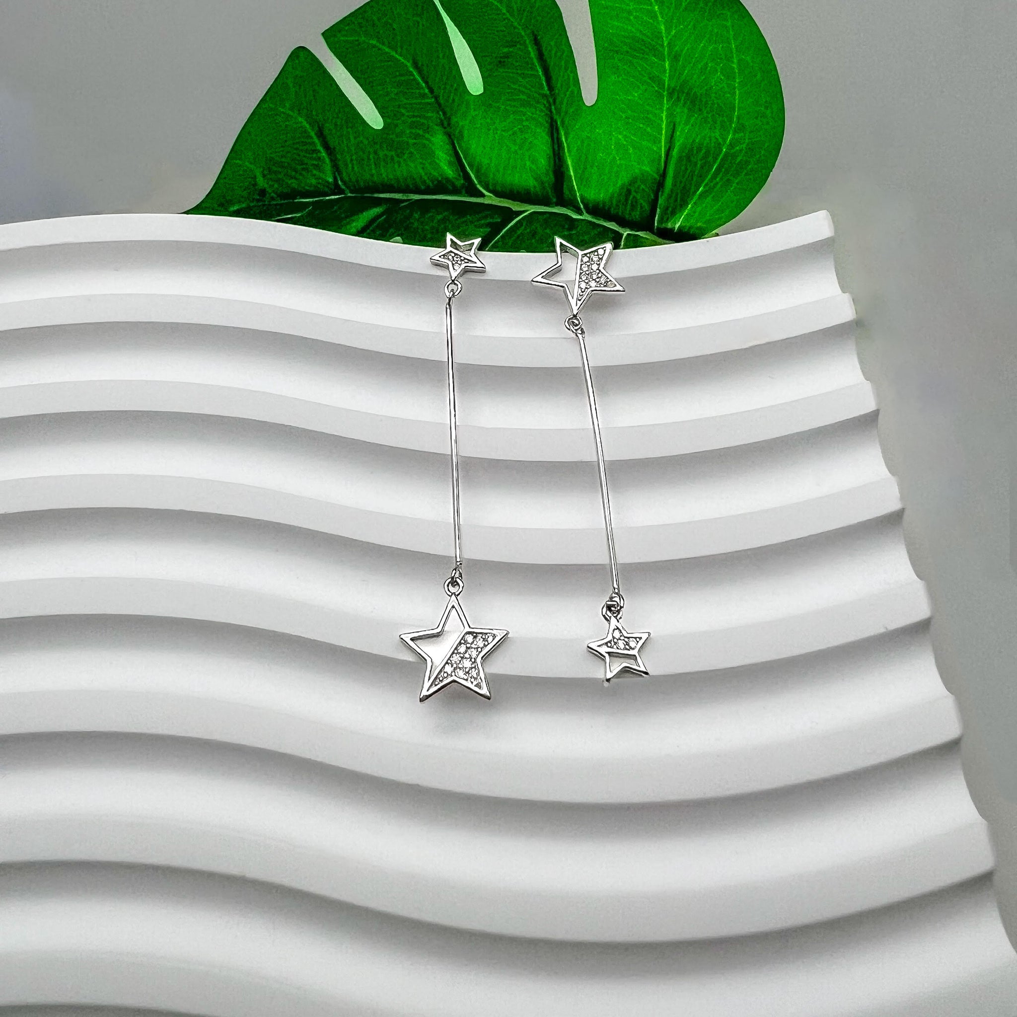 Aretes de plata estrellita colgante