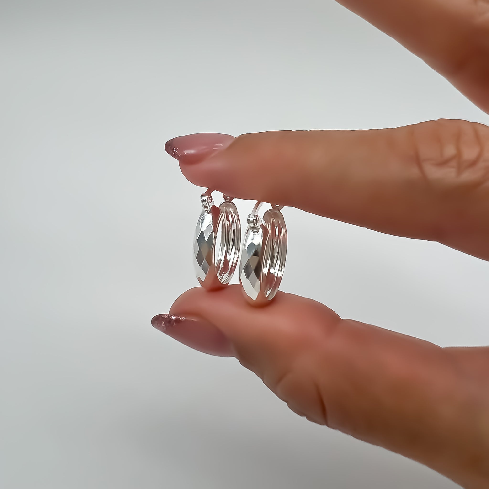 Arracadas de plata facetada