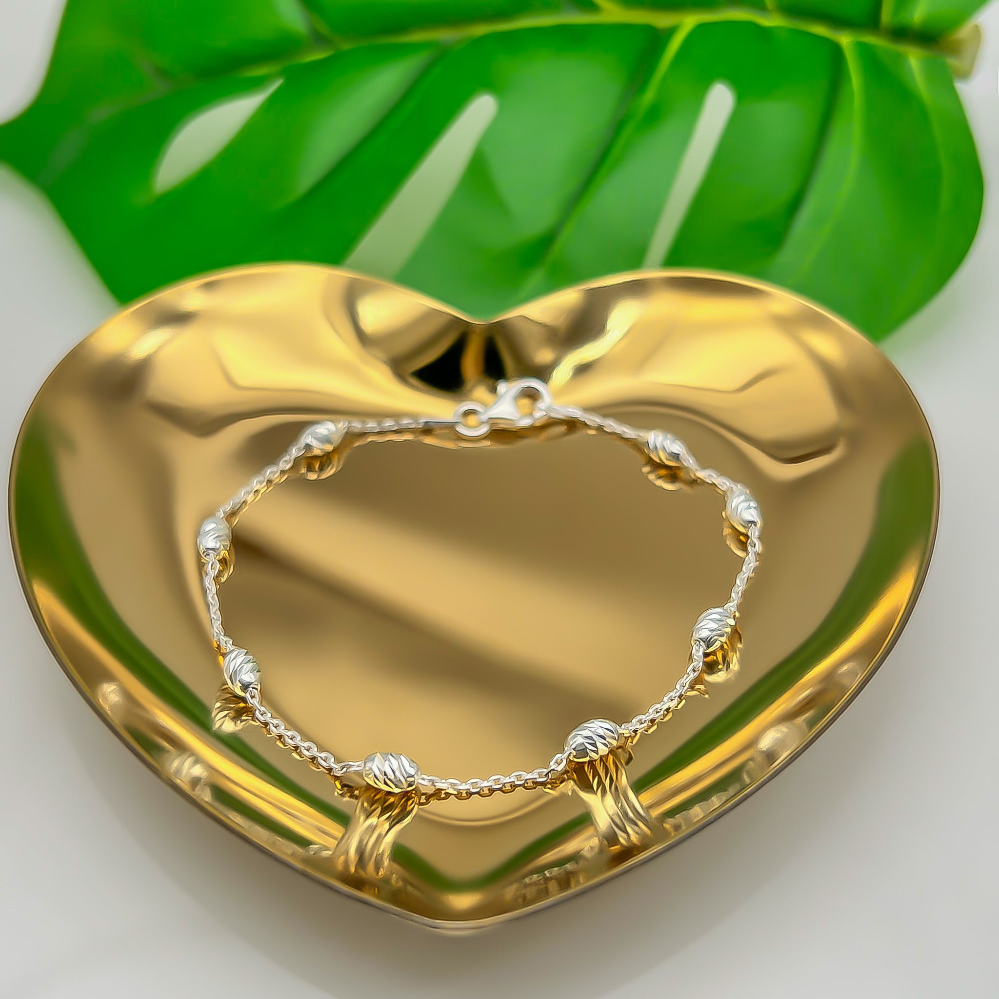 Pulsera de plata con ovalitos diamantados